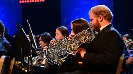 Group of french horn players performing in the Wind Symphony